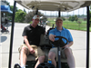 Golfers Sitting in Their Cart